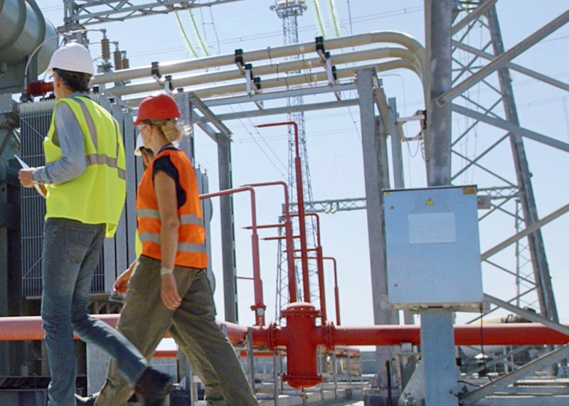 Construction workers at a power plant