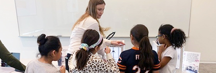 Elementary school girls visting William Blair