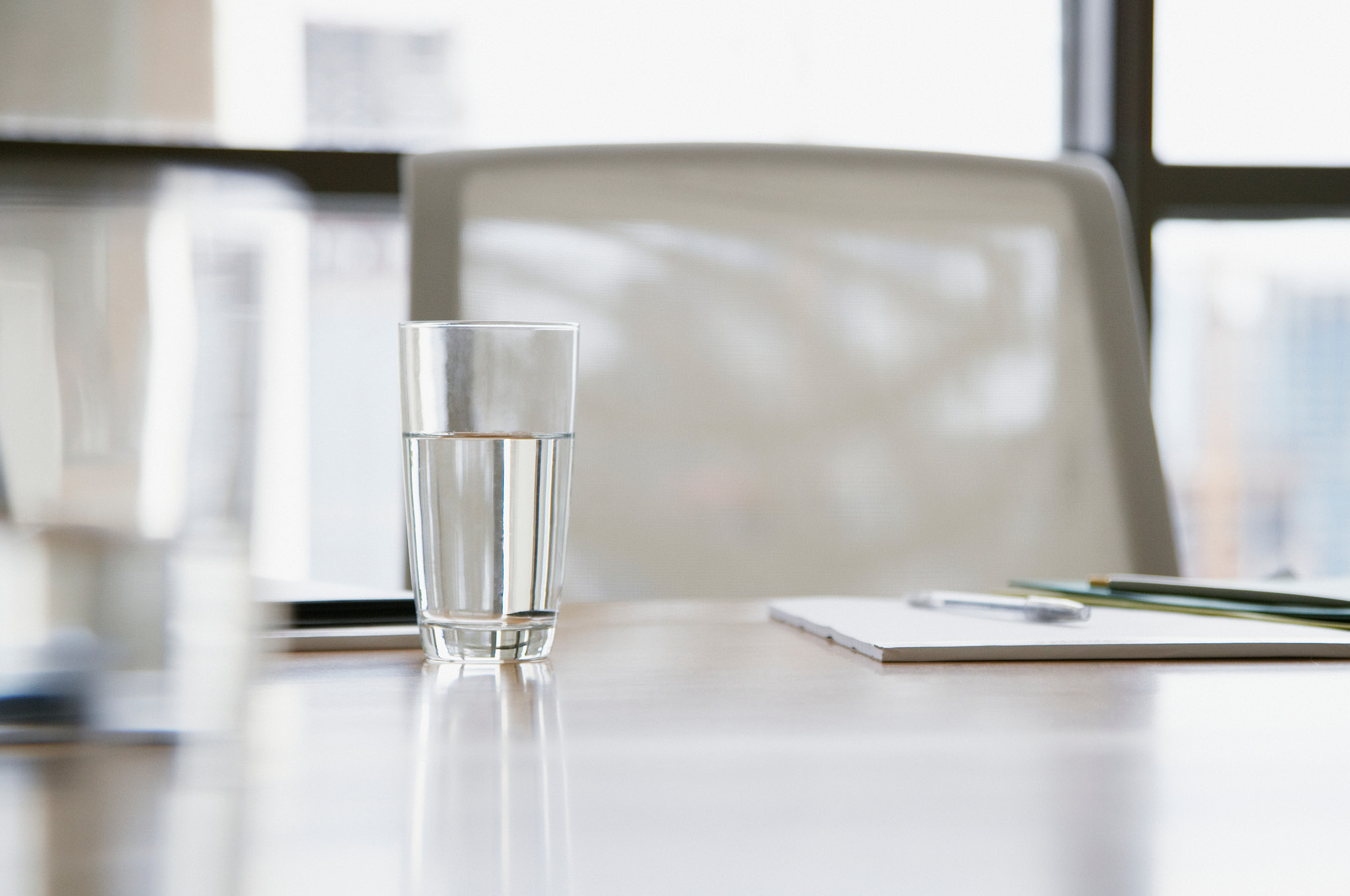Glass of water on a desk