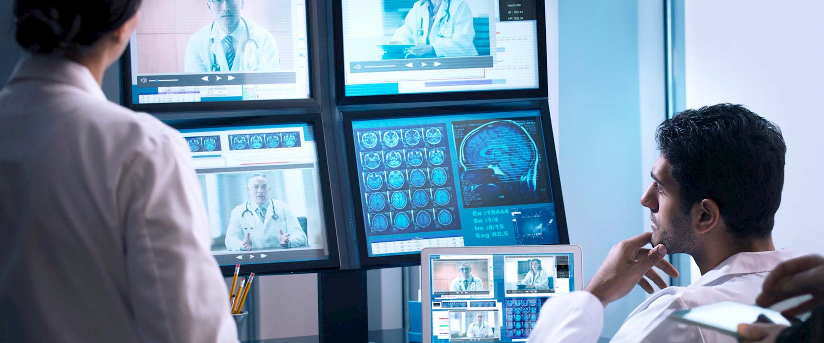 Doctor looking at a computer