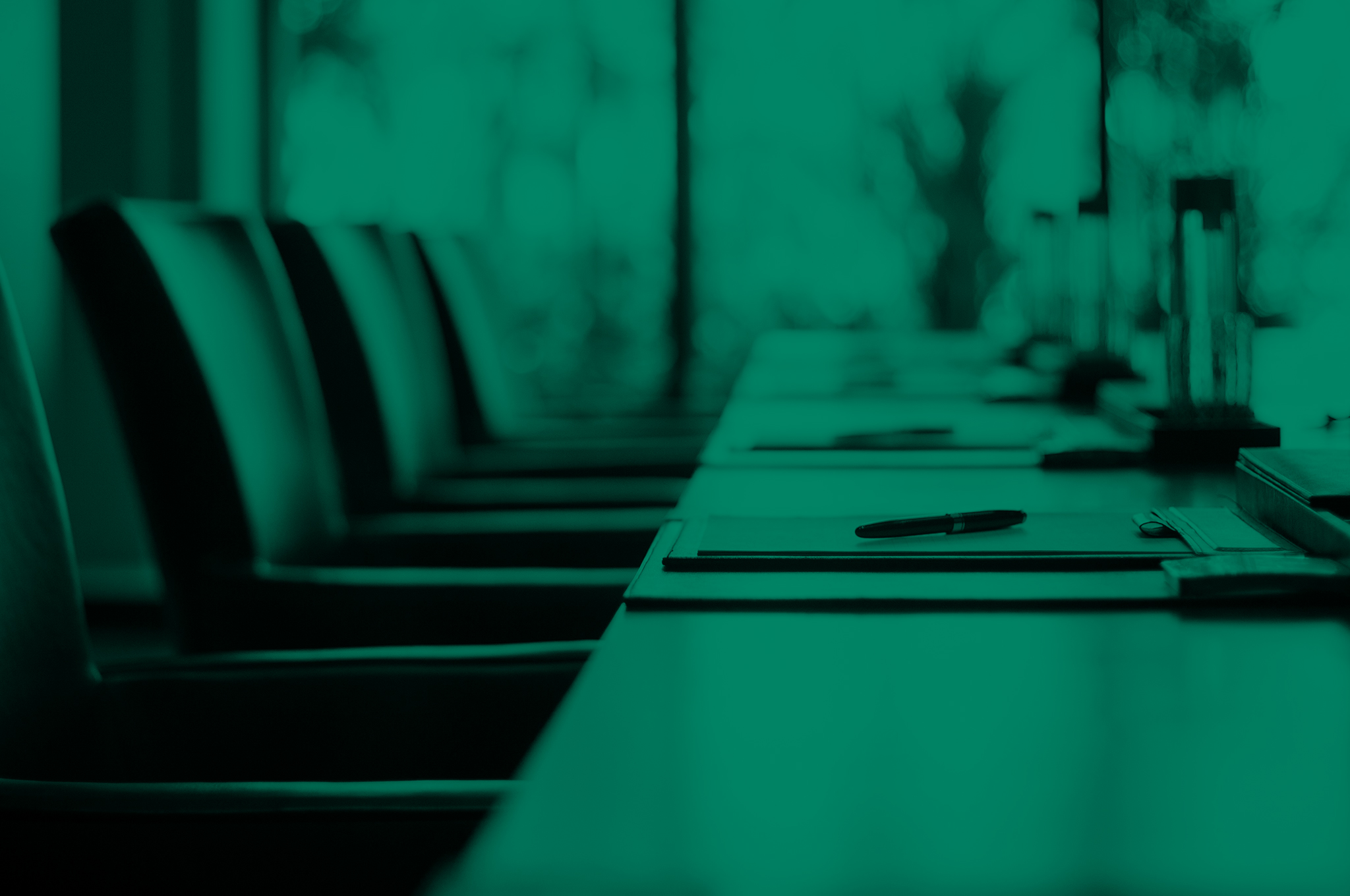 Chairs at a conference room table (green overlay)